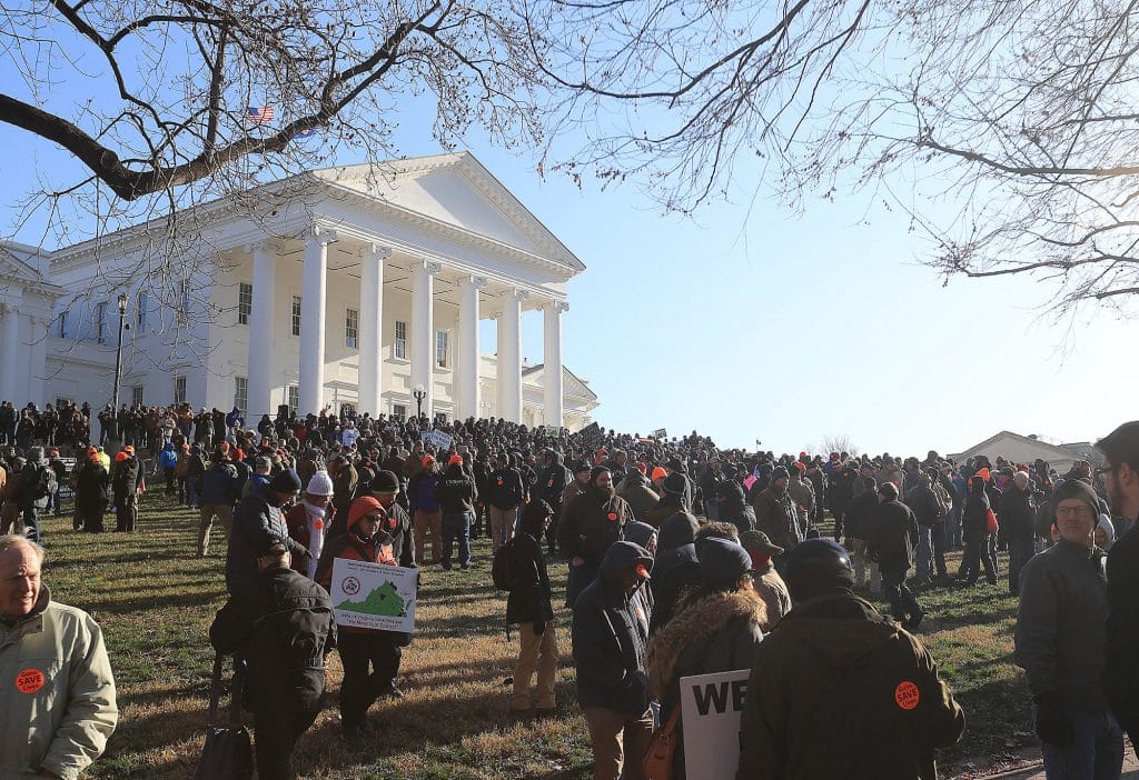 Gun rights protestors gather under the Virginia State Capitol for a rally in support of Second Amendment rights on January 20, 2020,
