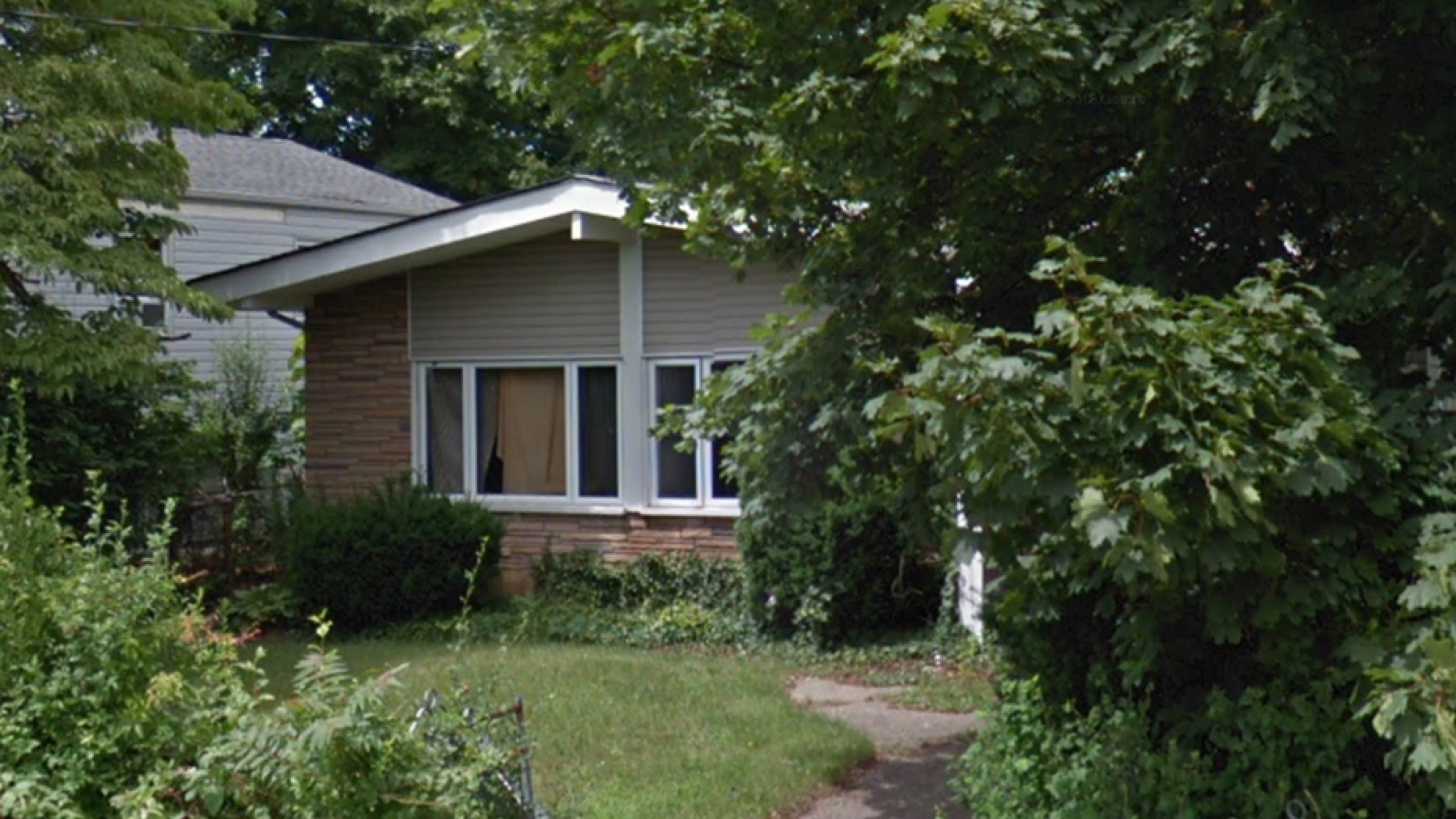 Wilmer Maldonado Rodriguez was found dead Sunday behind this home in New Cassel, N.Y., police say. 