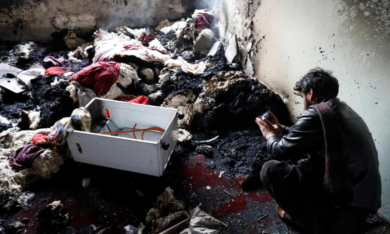 Items strewn around a Sikh religious complex after an attack in Kabul, Afghanistan