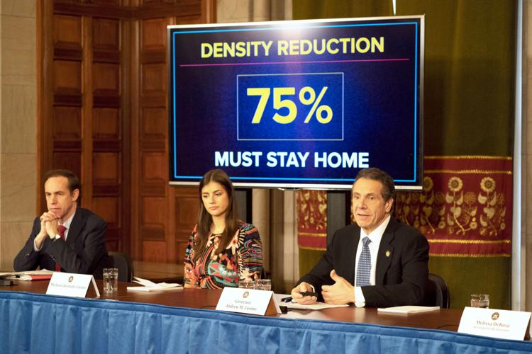 New York Gov. Andrew Cuomo (right) holds his daily coronavirus briefing March 19, 2020.