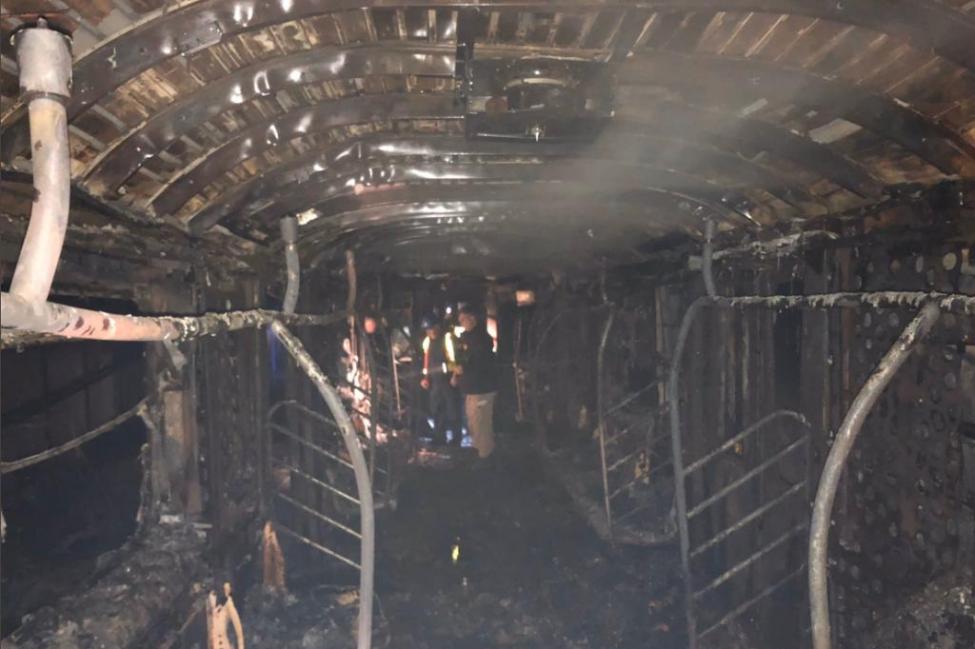 A fire on a New York City subway car, seen here destroyed in the fire, killed one person and injured at least 16,