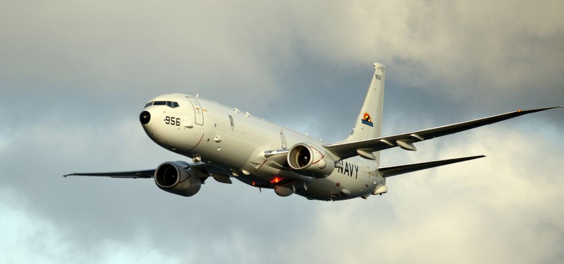 A P-8A Poseidon conducts flyovers above the Enterprise Carrier Strike Group during exercise Bold Alligator 2012. 