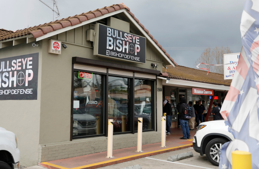 SAN JOSE, CALIFORNIA – MARCH 17: Shoppers wait in line outside of Bullseye Bishop on Meridian in San Jose, Calif.,
