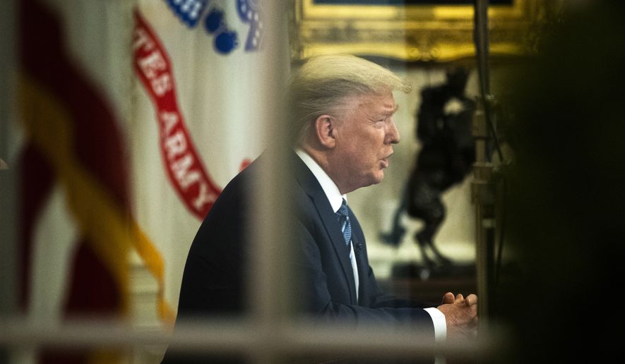 President Donald Trump addresses the nation from the Oval Office at the White House, 