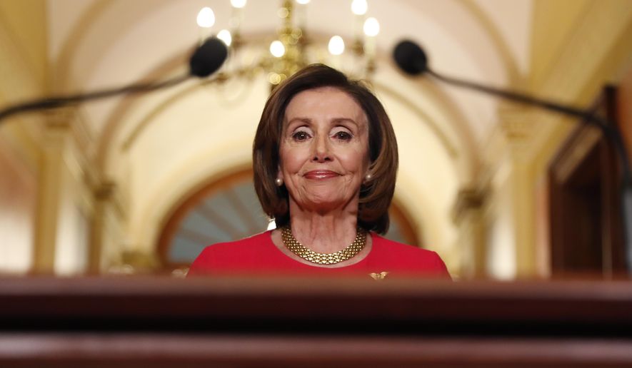 House Speaker Nancy Pelosi of Calif., arrives to speak outside her office on Capitol Hill, Monday, March 23, 2020. 