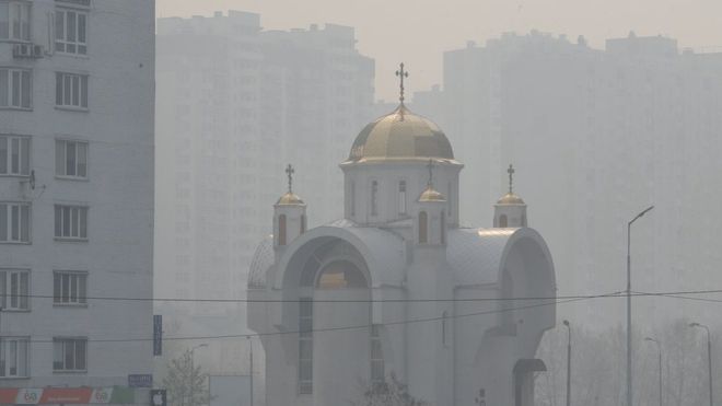 Haze from nearby wildfires shrouds buildings in Kyiv.EPA
