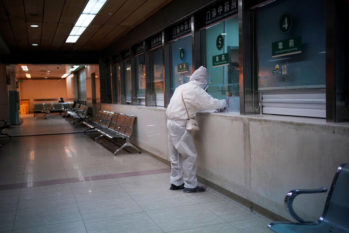 A woman wearing a protective suit at a hospital in Wuhan, China.