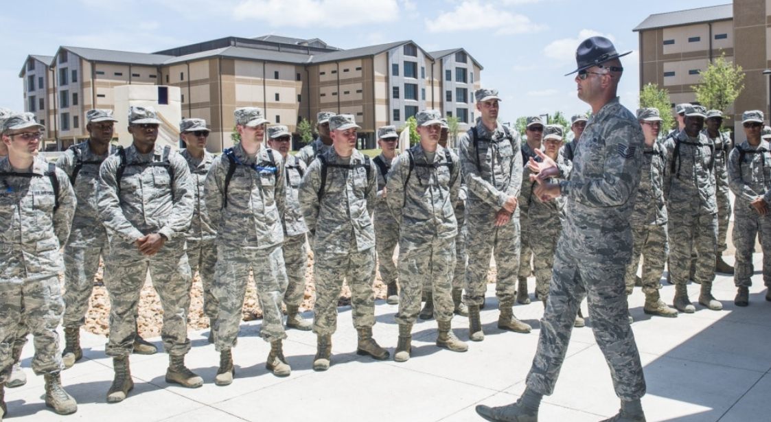 Tech. Sgt. Paul Couch, 323rd Training Squadron military training instructor, provides a tour to chaplain candidates of an Airman Training Complex at Joint Base San Antonio-Lackland, Texas, July 5, 2017.