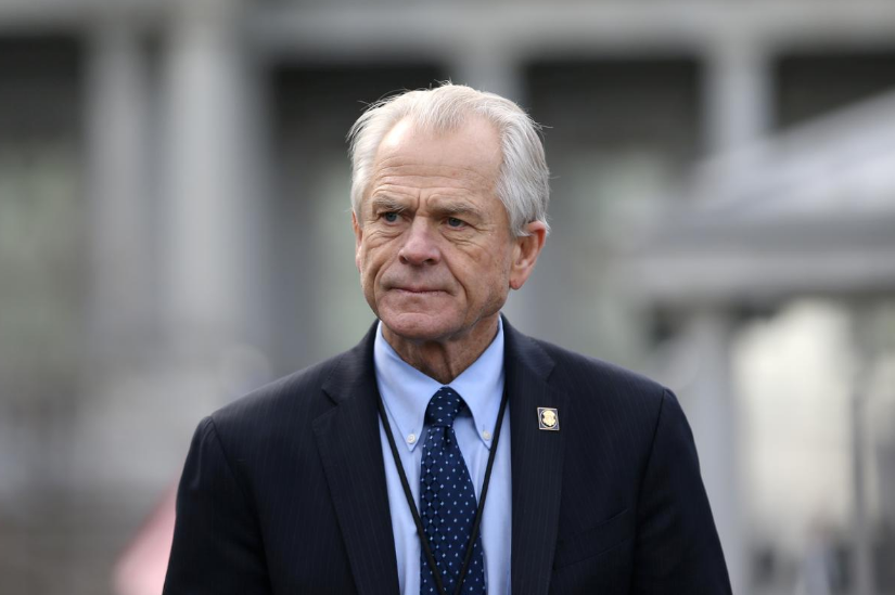 FILE PHOTO: White House trade adviser Peter Navarro listens to a news conference about a presidential executive order