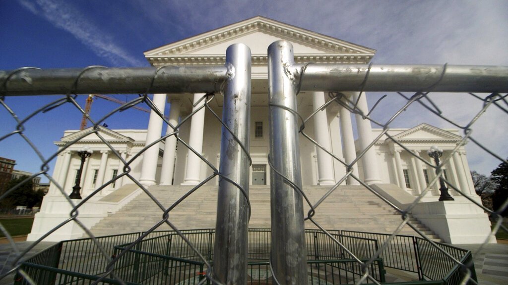 The Virginia Capitol building in Richmond is surrounded by fencing on Jan. 16, 2020,