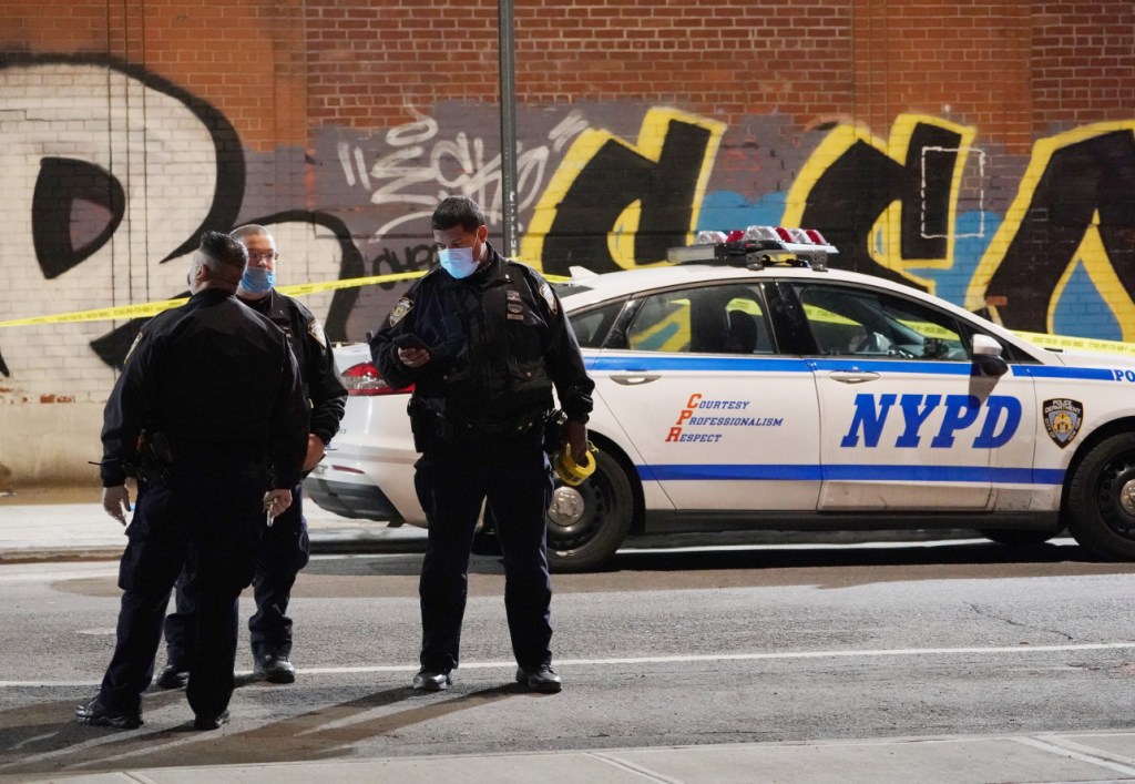 Police at the scene where a person was stabbed on New York City's Lower East Side.
Christopher Sadowski