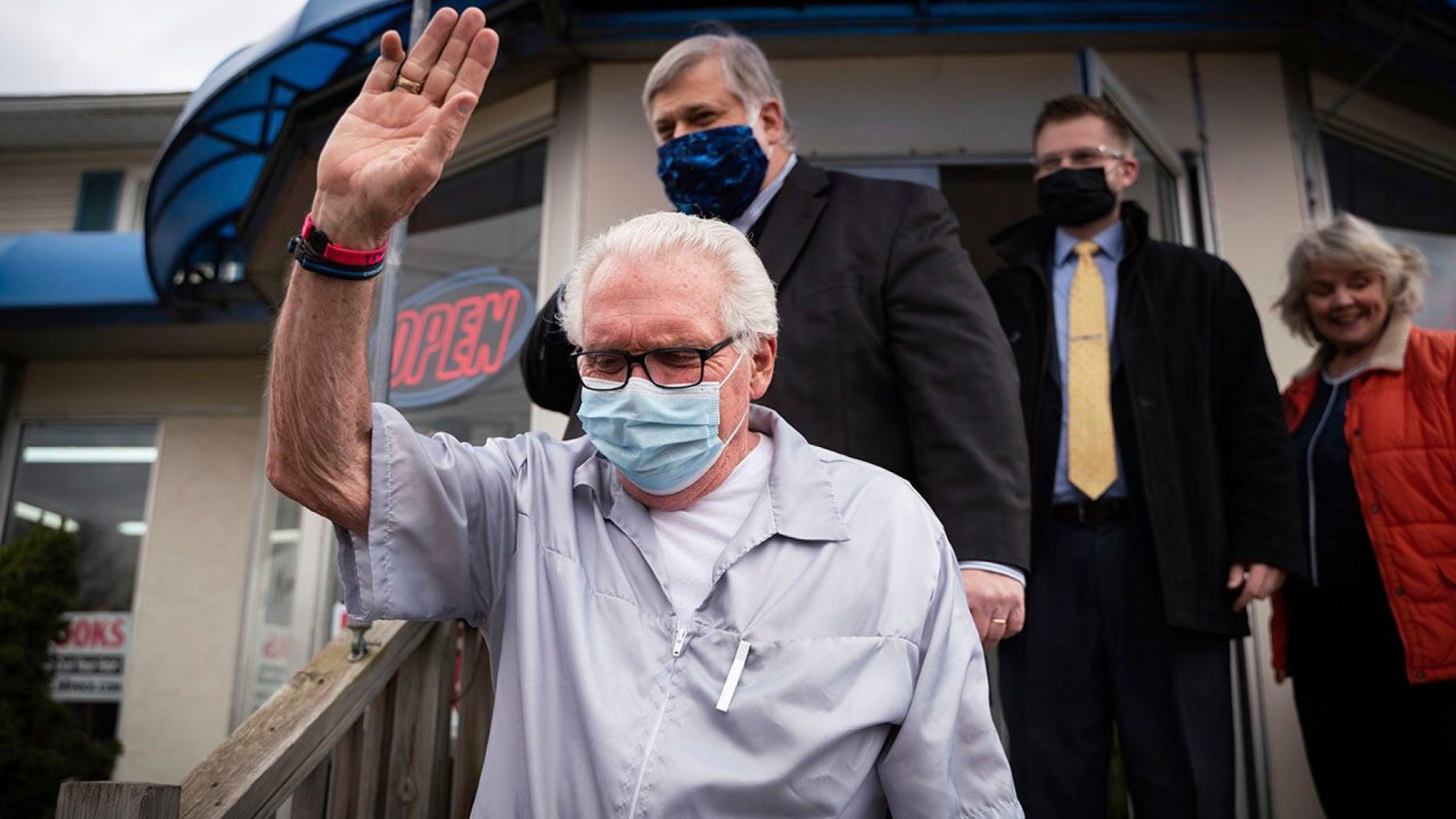Manke waved to supporters gathered just before a press conference outside on Monday. 