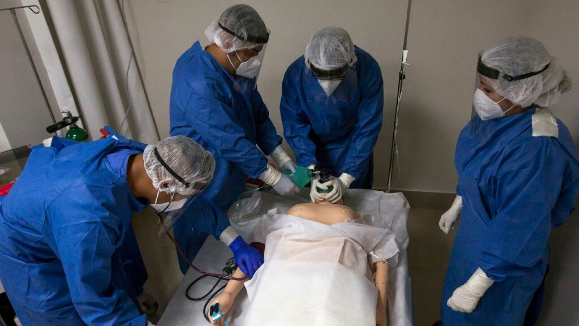 Military doctors and nurses train with a mannequin on the premises of a hospital to receive patients with Covid-19 in Monterrey, Nuevo Leon, Mexico, on May 18, 2020.