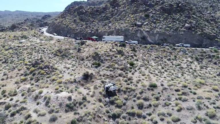 An infant is dead after police say her father threw her into a ravine following a crash on Highway 74, police say. 