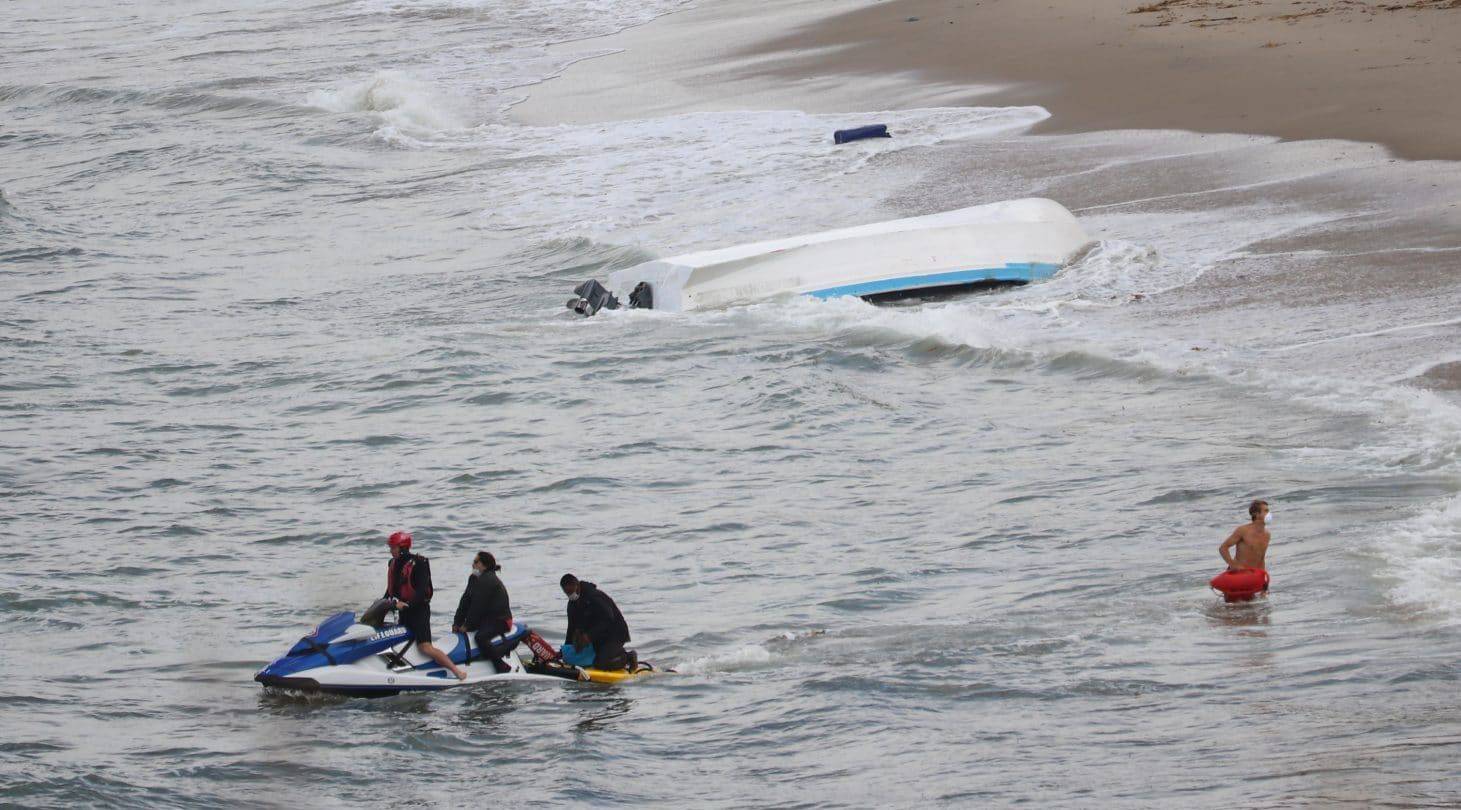 A panga that officials said was being used to smuggle people into the country capsized in Sunset Cliffs early Monday; 