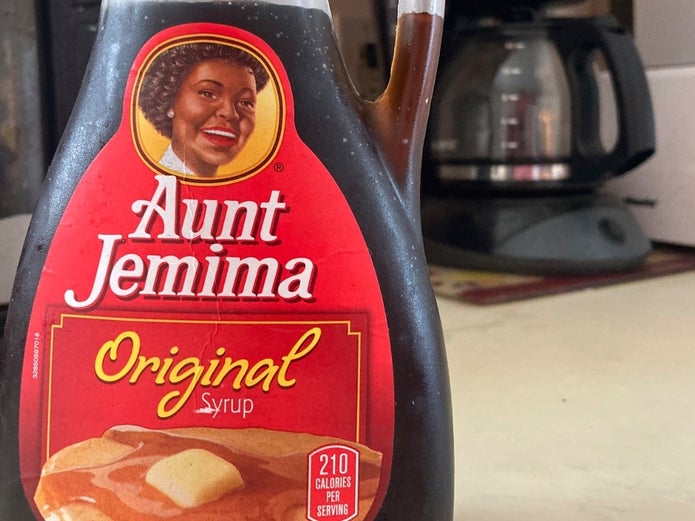Aunt Jemima's great-grandson says "retiring" racially charged brand erases his family legacy, and America's ugly history of profiting on slave imagery. 