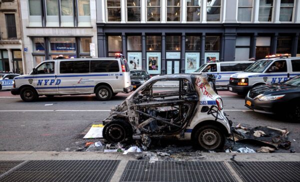 A destroyed NYPD police car is seen after a night of protest in Lower Manhattan in New York City on June 1, 2020.