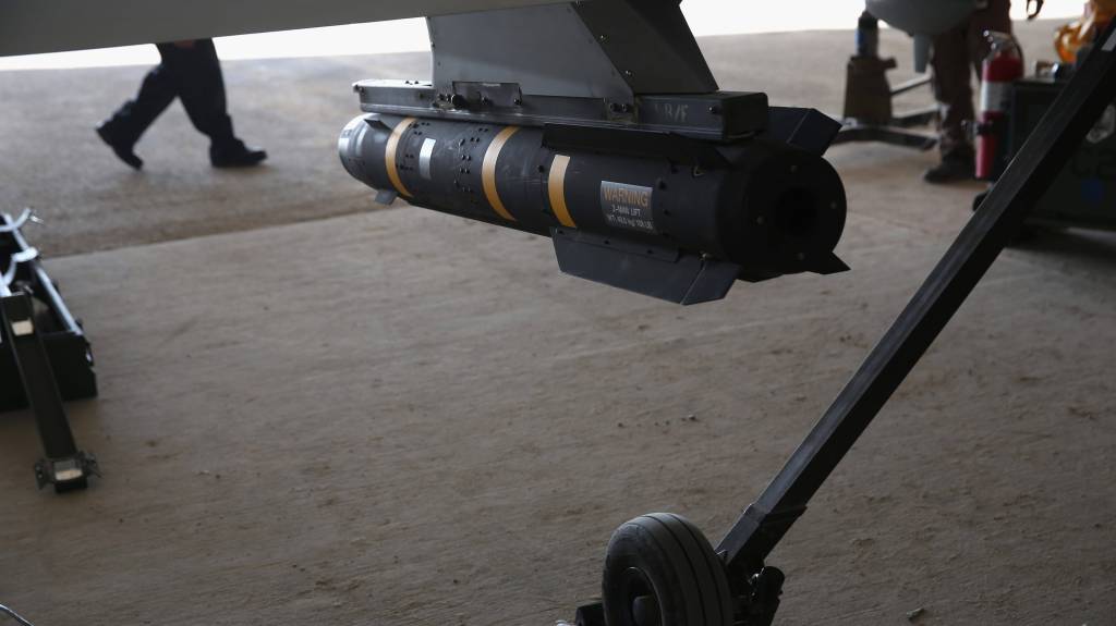 A Hellfire missile hangs from a U.S. Air Force MQ-1B Predator unmanned aerial vehicle (UAV) 