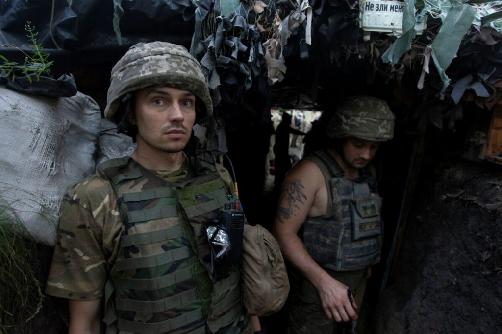 Ukrainian servicemen are seen at a position on the front line near the town of Novotoshkivske in Luhansk region, Ukraine July 26, 2020.