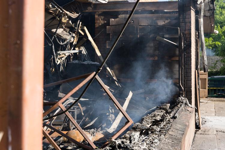 A burned down building in Minneapolis following a night of rioting in response to the death of George Floyd.