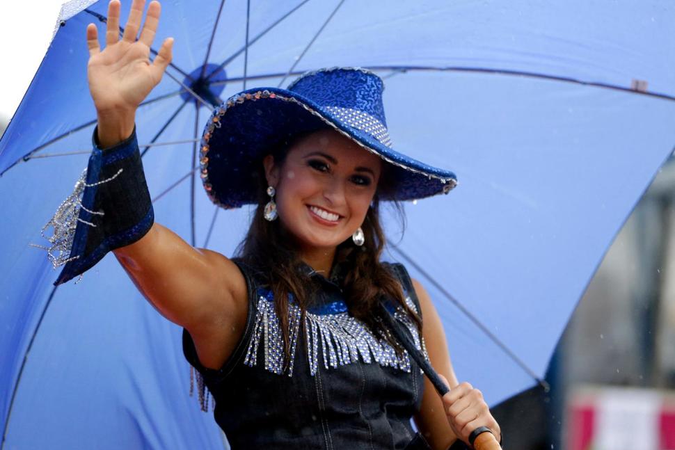 FILE - In this Sept. 13, 2014 file photo, Miss Kentucky Ramsey Carpenter participates in the Miss America Shoe Parade at the Atlantic City boardwalk in Atlantic City, N.J