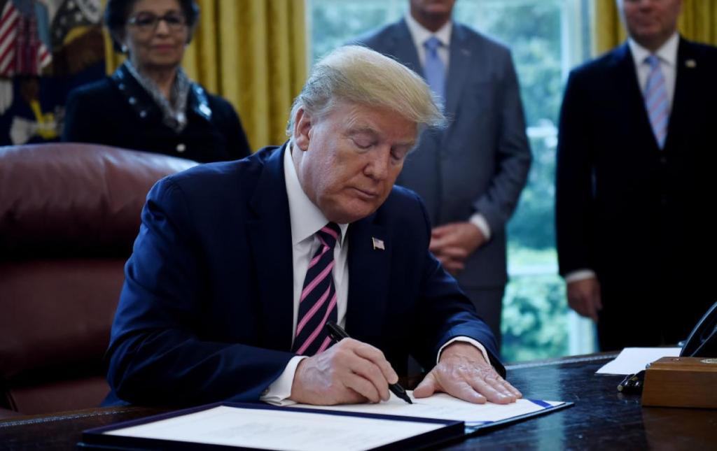 President Donald Trump signs the Paycheck Protection Program and Health Care Enhancement Act, 4/24
