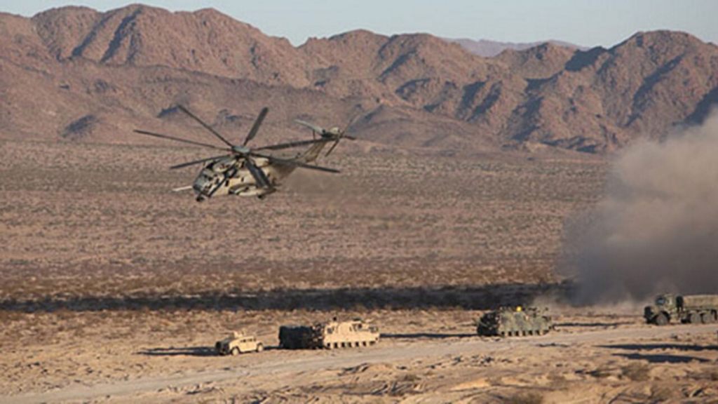 A CH-53E Sea Stallion Helicopter flies in for a simulated medical evacuation ,