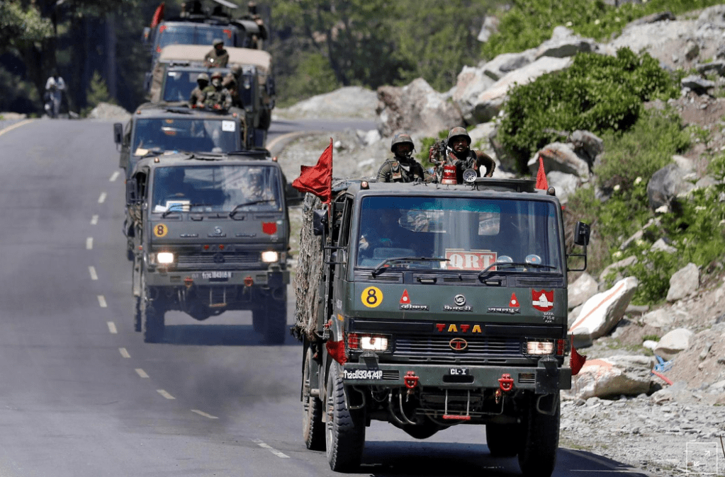 FILE PHOTO: An Indian Army convoy moves along a highway leading to Ladakh, at Gagangeer in Kashmir's Ganderbal district June 18, 2020.