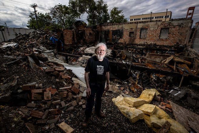 Don Blyly stood on the ruins of Uncle Hugo's Science Fiction & Uncle Edgar's Mystery Bookstores on S. Chicago Avenue in Minneapolis on Wednesday.