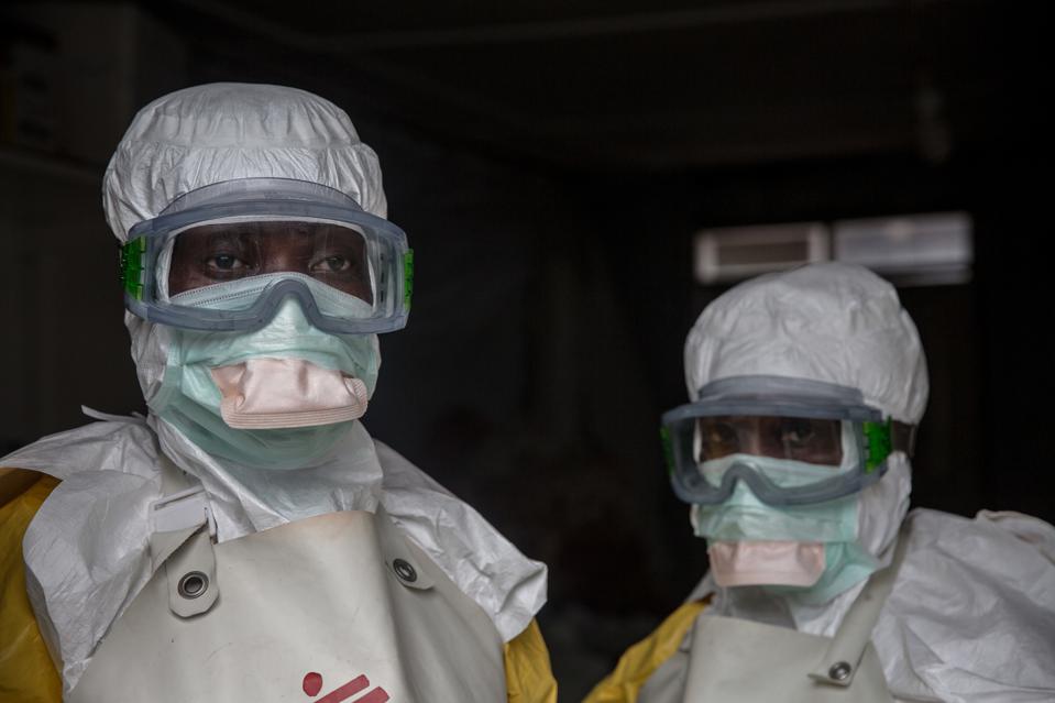 GOMA, NORTH KIVU, DEMOCRATIC REPUBLIC OF CONGO - Medical staff dressed in protective gear 