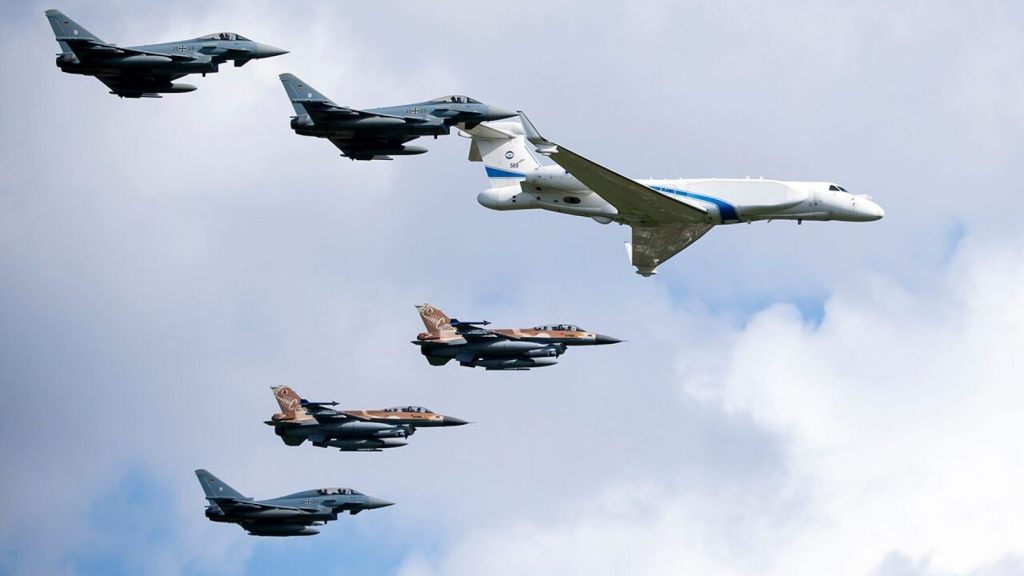 German air force Bundeswehr Eurofighters and an Israeli Air Force jets fly in formation over the Fuerstenfeldbruck airbase in commemoration of the 1972 Olympic Games assassination attempt in Fuerstenfeldbruck, Germany, Tuesday, Aug. 18, 2020.