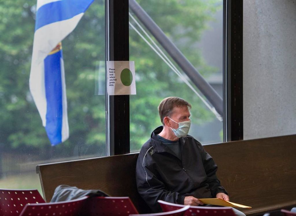 Michael Patrick McNutt waits for sentencing at Nova Scotia Supreme Court in Halifax on Tuesday. McNutt was sentenced Tuesday to 15 years in prison for decades-old child sex assaults.