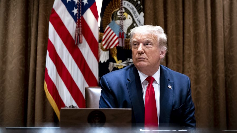 President Donald Trump makes remarks as he meets with tech workers and signs an Executive Order on Hiring Americans, in the Cabinet Room of the White House on August 3, 2020.