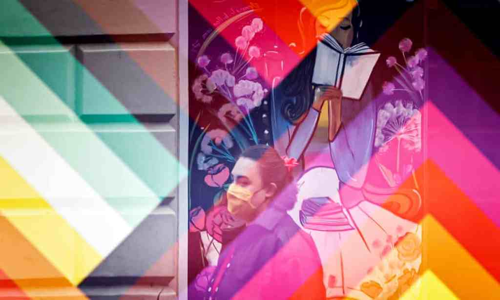 A shopper in Leeds, one of 28 areas with at least double the average infection rate in England.