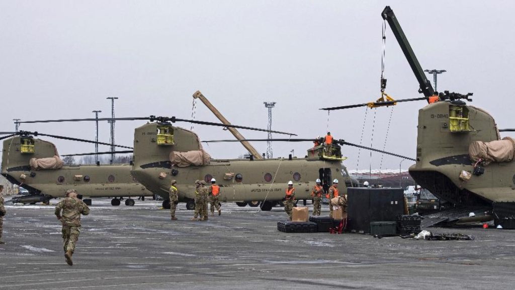 U.S. Technicians prepare helicopters for the transport in Bremerhaven, northern Germany, Sunday Feb. 12, 2017.