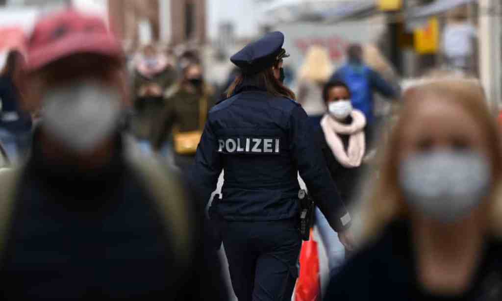 Police check on mask compliance in Munich, Germany. Photograph: Christof Stache/AFP/Getty Images
