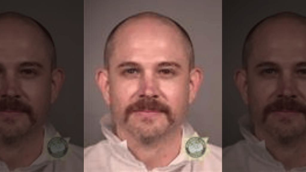 John B Russell, 41, is facing multiple charges following the incident. (Multnomah County Sheriff's Office)