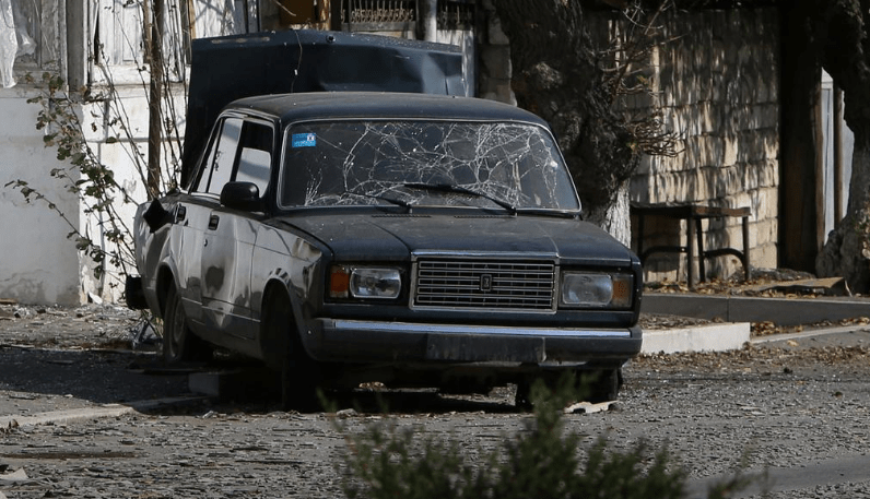 A view shows a car damaged by shelling during the military conflict over the breakaway region of Nagorno-Karabakh, in the town of Martuni October 27, 2020. 