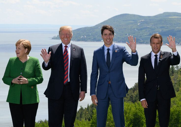 German Chancellor Angela Merkel, U.S. President Donald Trump, Canadian Prime Minister Justin Trudeau, and French President Emmanuel Macron.