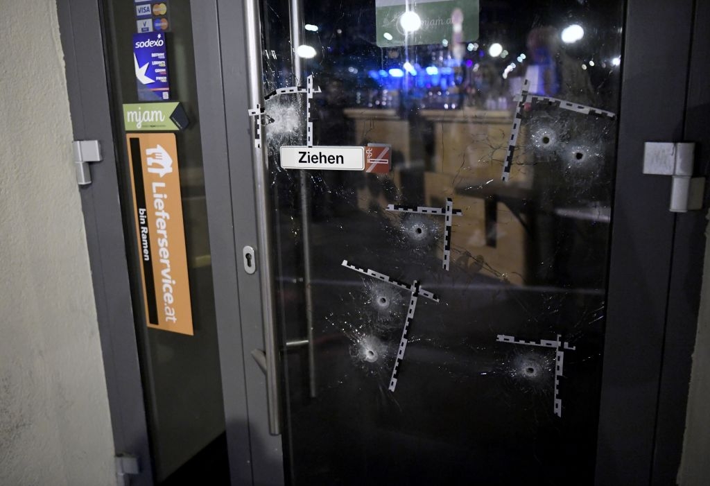 The door of a restaurant, riddled with bullet holes, in Vienna, Austria on November 3, 2020, the day after a terror attack in which four people were killed.