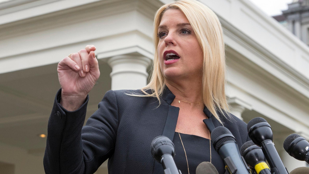 FILE - In this Feb. 22, 2018 file photo, Florida Attorney General Pam Bondi, speaks to reporters outside the West Wing in Washington.