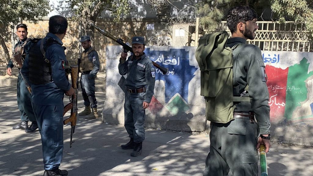 Afghan police arrive at the site of an attack at Kabul University in Kabul, Afghanistan, Monday, Nov. 2, 2020. Gunfire erupted at the university in the Afghan capital early Monday and police have surrounded the sprawling campus, authorities said.