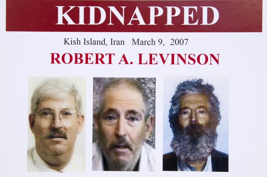 FILE - In this March 6, 2012, file photo, an FBI poster showing a composite image of former FBI agent Robert Levinson.