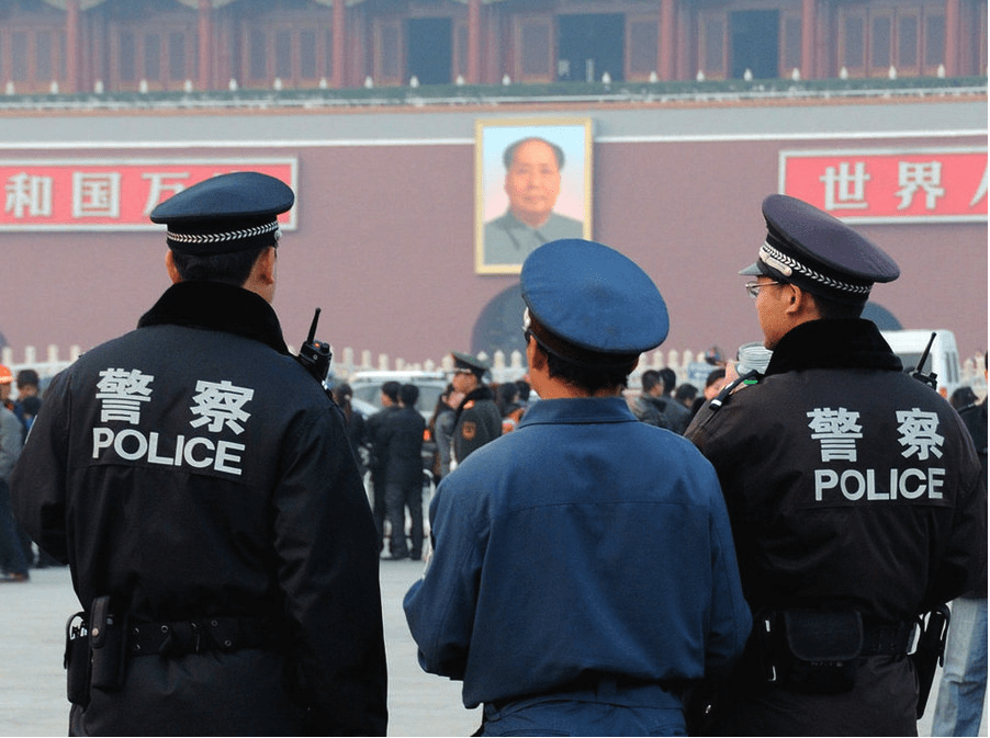 Chinese police standing in Beijing. (Beijing Patrol/Flickr)