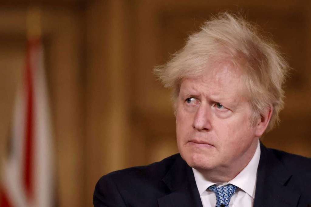 Britain's Prime Minister Boris Johnson speaks during a media briefing in Downing Street, London, Monday Dec. 21, 2020.