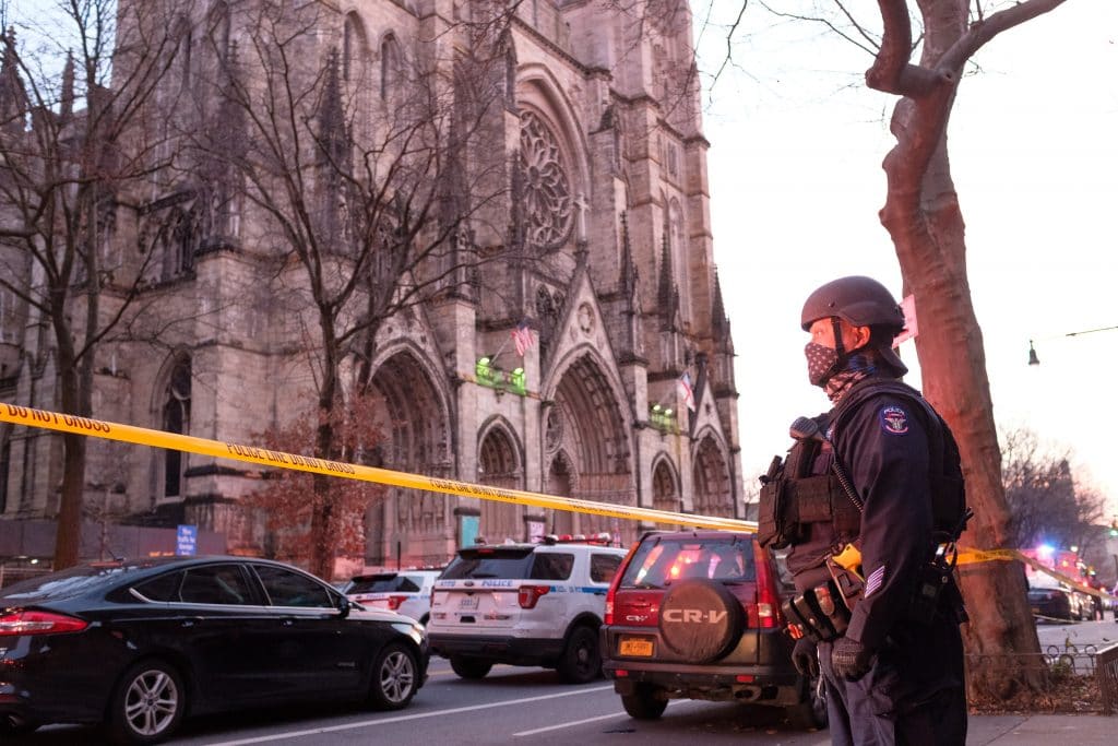 Police respond after a shooting outside a Cathedral in Manhattan. (Gardiner Anderson/New York Daily News/TNS)