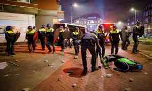 Police officers clashed with young people in Rotterdam, the Netherlands. Photograph: Marco de Swart/EPA
