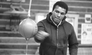 Muhammad Ali punches a bag in his Deer Lake, Pa., training camp where he was preparing for his rematch with Joe Frazier, on Jan.10, 1974.