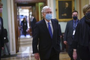 Sen. Mitch McConnell, R-Ky., the top Republican in Senate, leaves the chamber at the Capitol in Washington, Wednesday, Jan. 20,