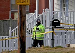 Wakefield MA. - January 19:Police investigate a home on Otis Street where police shot a man during an investigation into the death of a woman inside on January 19, 2021 in Wakefield, MA.